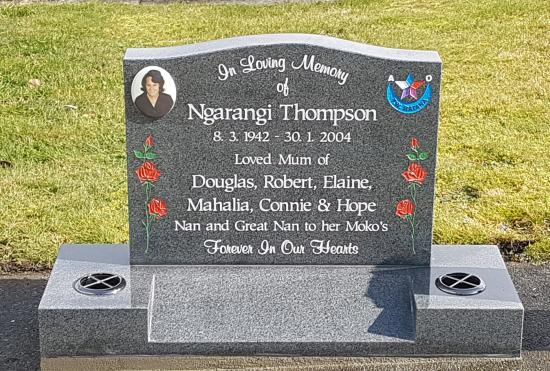 Classic upright headstone with low saddle top crafted from granite by Stoneworx - Memorials of Distinction in New Zealand.