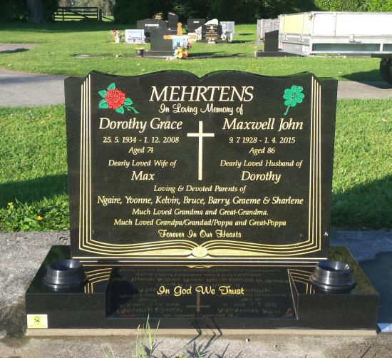 Classic upright headstone in the ‘book’ shape crafted from granite by Stoneworx - Memorials of Distinction in New Zealand.