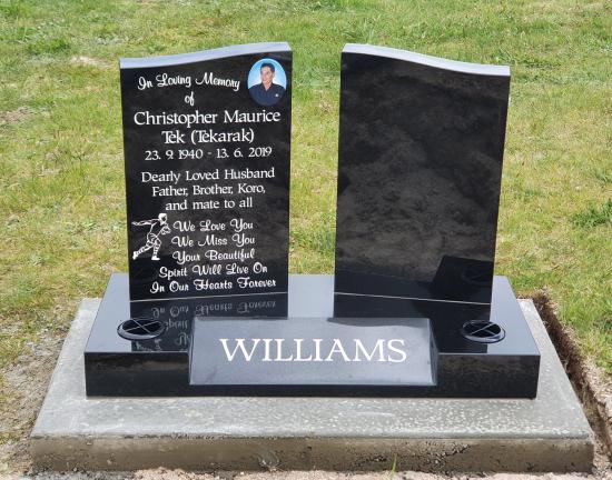 Double upright headstones with half low saddle top crafted from granite by Stoneworx - Memorials of Distinction in New Zealand.