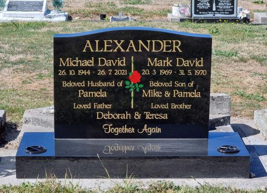 Classic upright headstone with low saddle top crafted from granite by Stoneworx - Memorials of Distinction in New Zealand.
