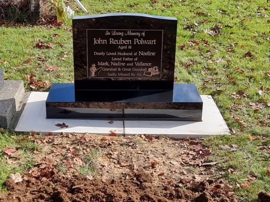 Classic upright headstone with low saddle top crafted from granite by Stoneworx - Memorials of Distinction in New Zealand.