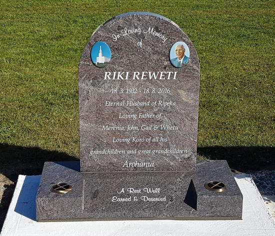 Classic tall upright headstone with a radius top crafted from granite by Stoneworx - Memorials of Distinction in New Zealand.