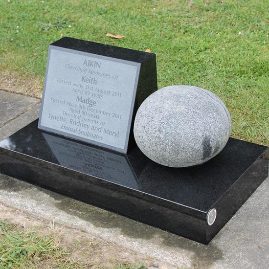 Custom headstone with rock crafted from granite by Stoneworx - Memorials of Distinction in New Zealand.