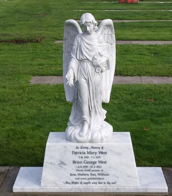 Carved angel custom headstone crafted from granite by Stoneworx - Memorials of Distinction in New Zealand.