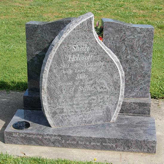 Tear drop shape headstone crafted from granite by Stoneworx - Memorials of Distinction in New Zealand.