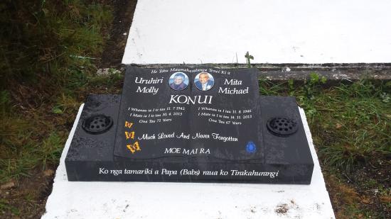 Low rise memorial in a book shape crafted from granite by Stoneworx - Memorials of Distinction in New Zealand.