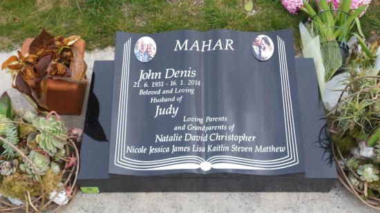 Low rise memorial in a book shape crafted from granite by Stoneworx - Memorials of Distinction in New Zealand.