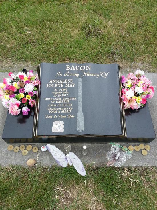 Classic upright headstone in the ‘book’ shape crafted from granite by Stoneworx - Memorials of Distinction in New Zealand.
