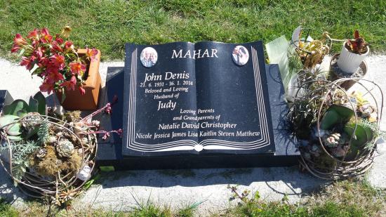 Classic upright headstone in the ‘book’ shape crafted from granite by Stoneworx - Memorials of Distinction in New Zealand.