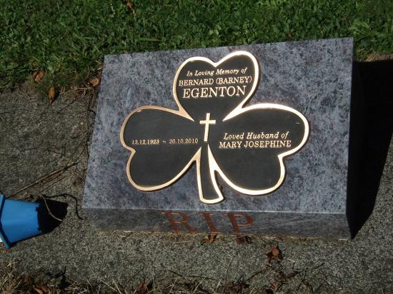Low rise memorial in a book shape with a shaped plaque crafted from granite by Stoneworx - Memorials of Distinction in New Zealand.