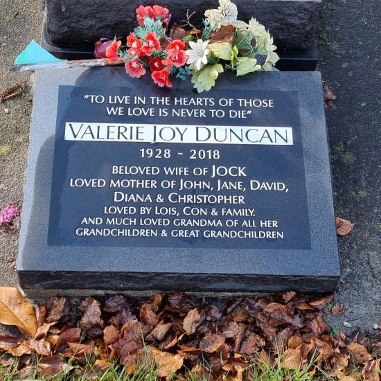 Low rise memorial in a square shape crafted from granite by Stoneworx - Memorials of Distinction in New Zealand.